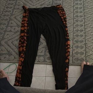 Fashion Nova Black and Orange Tie-Dye Leggings